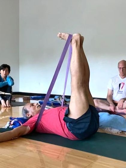 Supta Padangusthasana with a strap.