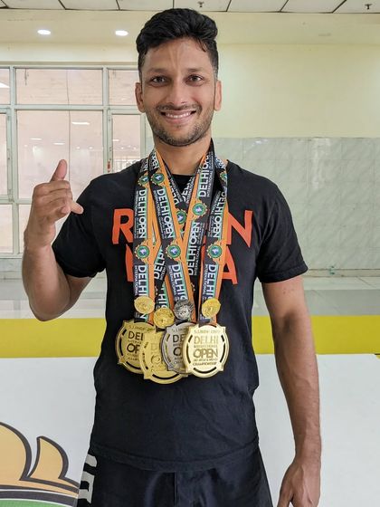 Jitendra with his incredible haul of three gold medals and one silver from the Delhi Open.