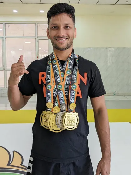 Jitendra with his incredible four medal haul from the Delhi Open. This is what dedication looks like: three golds and one silver.