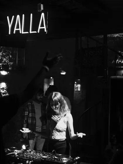 A moody, black and white shot from a gig at an underground club. Sometimes the most intense energy comes from more intimate venues where I can play deeper tracks and connect with every single person on the dance floor.