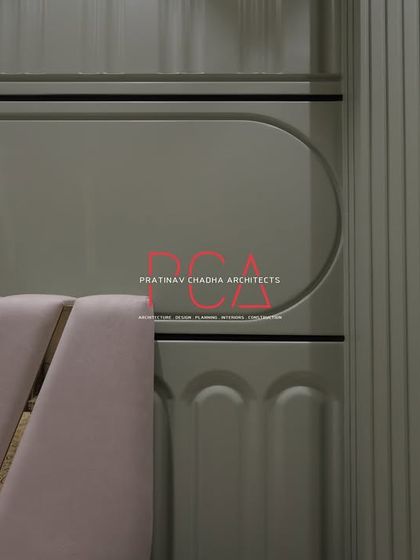 Detail of the master bedroom in 'The Cursive Abode', focusing on the junction of the upholstered headboard and the custom-molded wall paneling, showcasing the precision in material amalgamation.