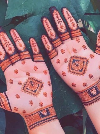 I guarantee a deep, dark henna stain. This photo shows the rich, beautiful color of my all-natural henna paste after it has fully developed.