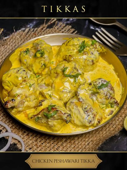 A skewer of our Chicken Peshawari Tikka, perfect for a rainy night. The creamy, rich coating on the smoky chicken makes it the ultimate comfort food.