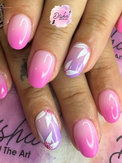 Everything pink and flowery is in this season. This design combines a pink and purple ombre with delicate, hand-painted white flowers.