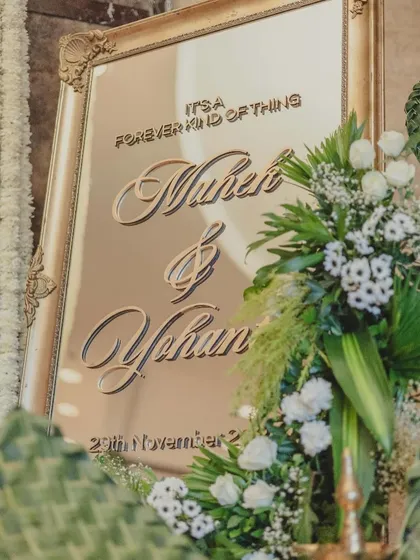 A detail of the custom calligraphy on the welcome mirror, reading "It's a forever kind of thing."