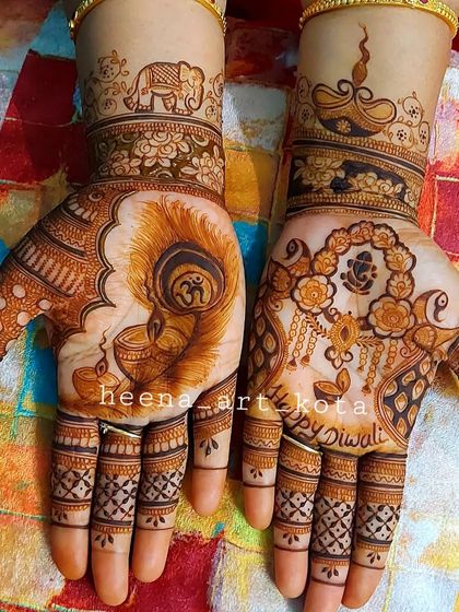 A vibrant Diwali-themed mehndi. The design incorporates diyas, peacock feathers, Ganesha, and "Happy Diwali" text, making it a perfect accessory for the festival of lights.
