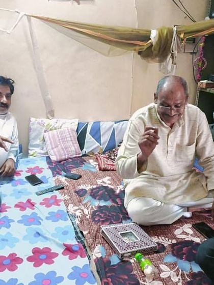 Sharing a simple cup of tea and conversation. Sometimes, just being present is the greatest service.