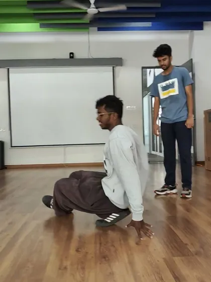 A shot from a training session at IIITB. Here, I'm working on floorwork technique. I often get invited to train with college dance clubs to help them level up.