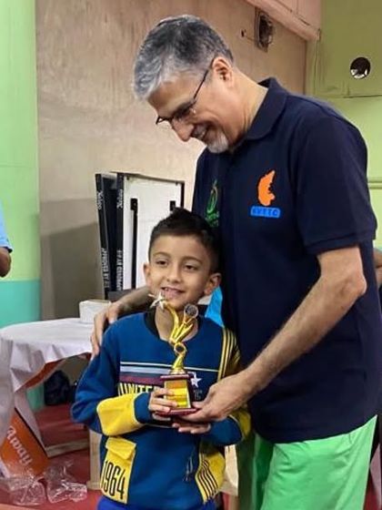 One of our youngest paddlers receiving his trophy.