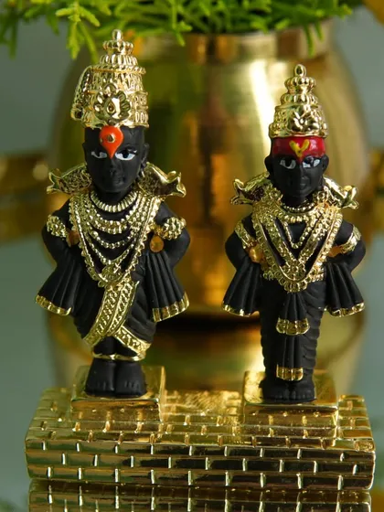 A keepsake to be treasured for generations. These finely detailed silver-plated Vithal and Rukmini idols are perfect as a housewarming gift or a blessed addition to your own pooja room.