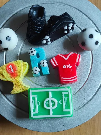 The football-themed soaps displayed on a platter, showing all the different elements of the set.