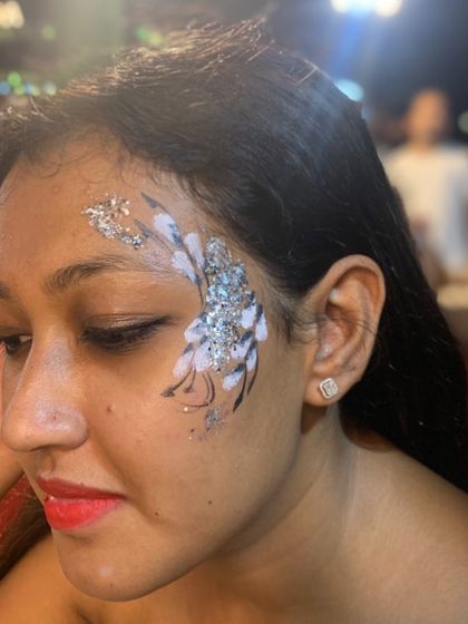 Whimsical Face & Body Art photo 26