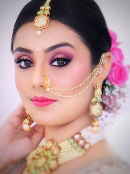 Signature Floral Buns & Updos photo 26