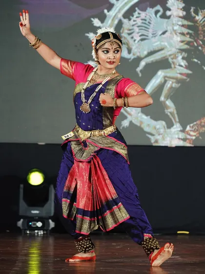 A senior category performer who won 2nd place. Her strong stance and focused expression show her command of the art form.