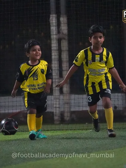 Two of our youngest players learning movement and positioning off the ball during a drill.