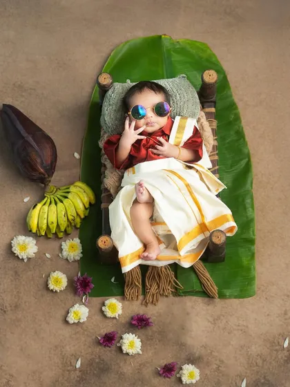 A touch of South Indian swag for this 17-day-old superstar. I enjoy creating unique and playful newborn concepts that reflect your culture and personality.