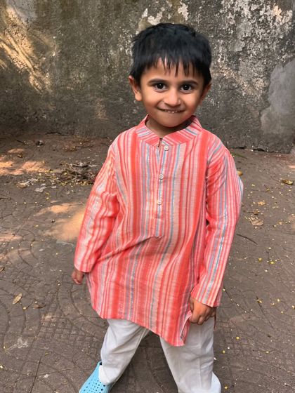 A duplicate of ID 96, this image reinforces the message of comfort and style with our striped pink cotton kurta set.