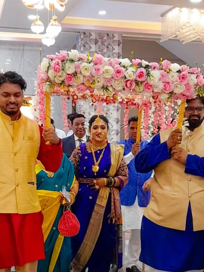This bride chose a pink and white floral canopy to complement her royal blue saree. I work with you to make sure every detail matches your vision.