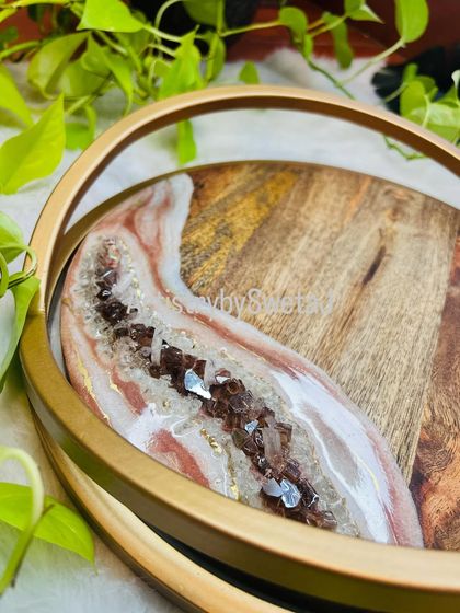 Another angle of the wood and resin tray, showing the beautiful grain of the wood next to the smooth, flowing resin.