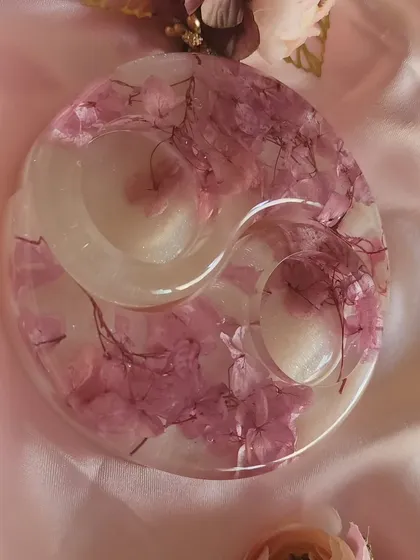 A still shot of the pink floral tealight holder, ready to be shipped.