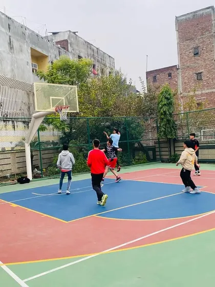 A player goes up for a layup in our evening session.