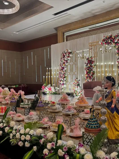 Another side view of the geometric stage, focusing on the detailed offering table.