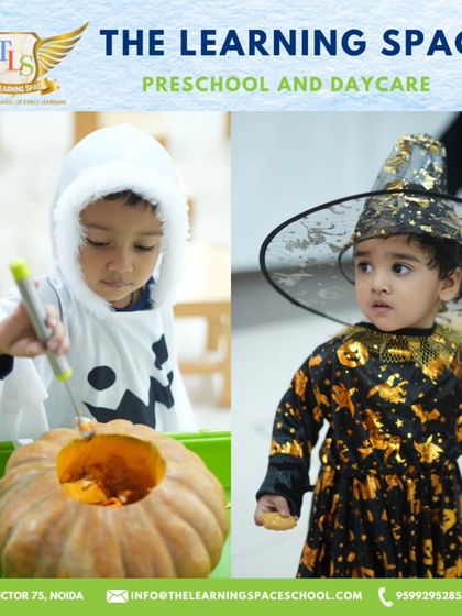 A little ghost and a little witch, both deeply engaged in our pumpkin carving activity. It’s a classic Halloween tradition that also builds fine motor skills.
