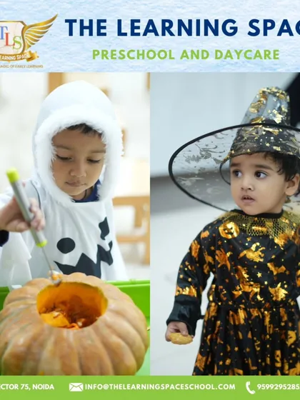 A little ghost and a little witch, both deeply engaged in our pumpkin carving activity. It’s a classic Halloween tradition that also builds fine motor skills.