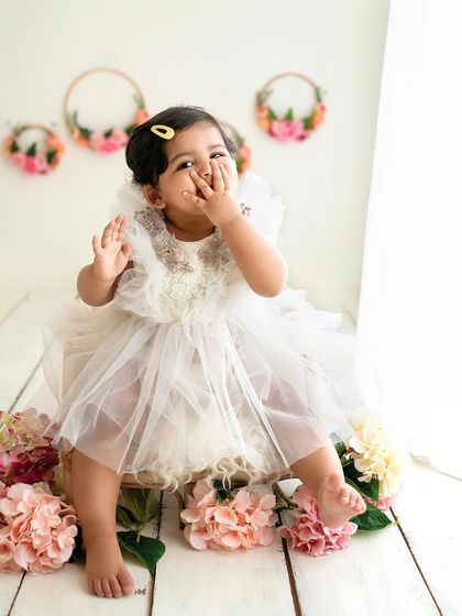 A flying kiss from this little sugar ball! Her personality just shines in this photo from her toddler session.