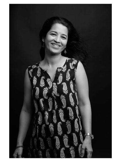 A final portrait from this extensive series, showing a happy and relaxed subject in a timeless black and white style.