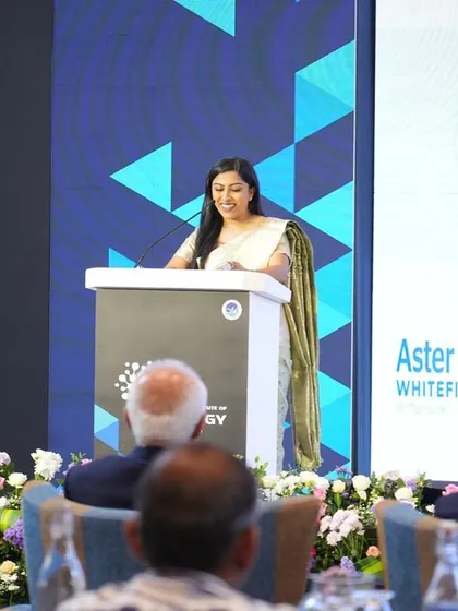 A candid shot while speaking at the Aster Whitefield Hospital event. I connect with my audience by being authentic and approachable, even in a formal corporate setting.