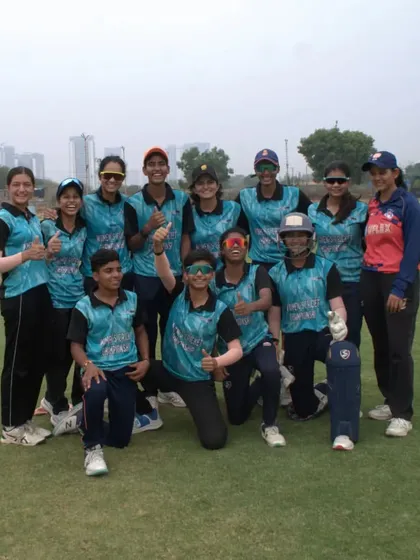 The winning feeling after a tough semi-final match. Our team poses for a group photo, celebrating their entry into the finals of the Women's Cricket Championship. The unity of this team is their greatest strength.