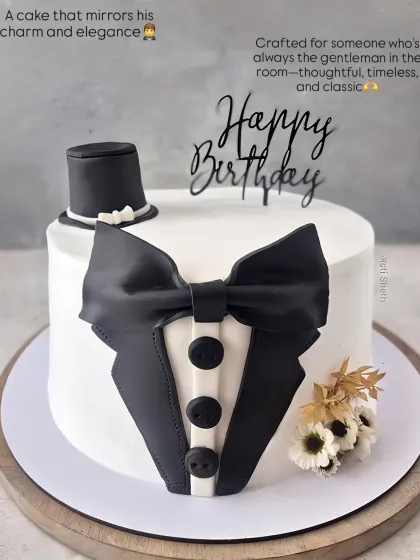 A sophisticated tuxedo-themed cake for a gentleman's birthday. This 2.5kg Chocolate Mousse cake features a handcrafted fondant bow tie and lapels.
