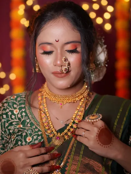 The complete look, showcasing the intricate details of the makeup and jewelry. My goal is always to ensure the bride feels confident and beautiful from every angle.