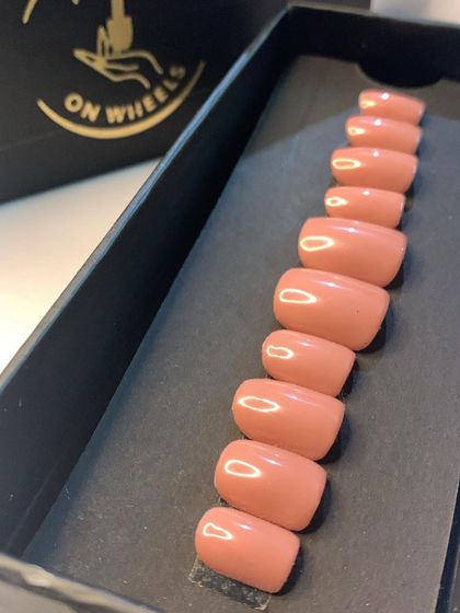 This is the 'Smoothie' shade from my 'Naked Series' of ready-to-wear press-on nails. It's a highly adaptable nude color in a short square shape, perfect for a quick, professional-looking manicure.