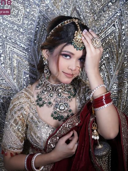 This image showcases a student's work against a dramatic, glittering backdrop. I teach my students about lighting and background to create impactful portfolio images.