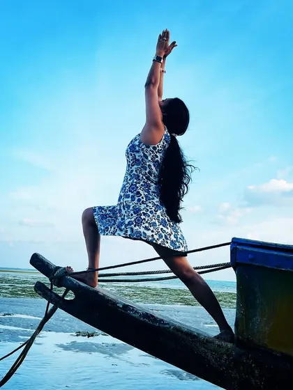 This moment, balancing on a boat, captures the essence of yoga for me. It is about finding stillness and strength, even when the world around you is in motion. My classes help you discover your own inner balance, on and off the mat.