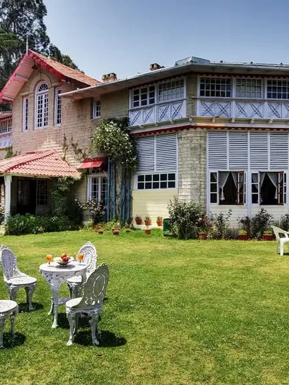The exterior of the Chevron Rosemount Hotel in Ranikhet, a heritage property we helped restore and design. The project involved preserving the classic colonial architecture while upgrading the facilities to provide modern comforts for guests.