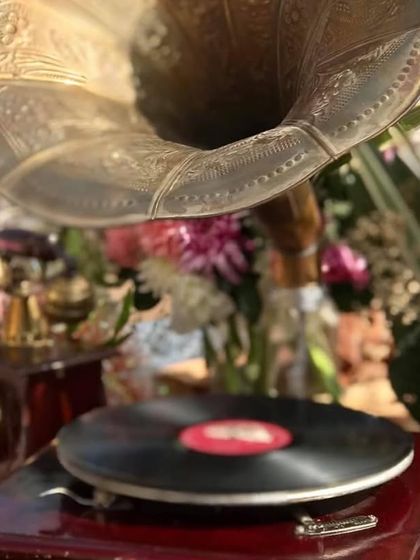 A vintage gramophone playing old songs set the perfect mood for this 70th birthday brunch. It's all about creating a complete sensory experience.