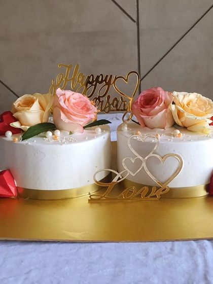 The twin anniversary cakes, ready to celebrate a special milestone for a lovely couple.