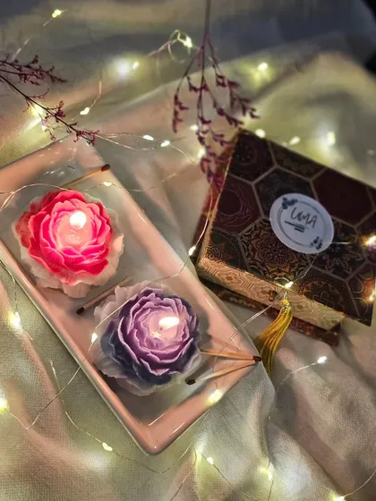 My Scented Peony Candles, lit and glowing, create a world of timeless elegance and tranquility. They come in a premium box, making them a perfect gift for Diwali, housewarmings, or any special occasion.