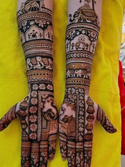 I can bring your wedding story to life with detailed figure work. This design shows a full baraat procession with doli, elephants, and musicians, creating a masterpiece on your arms.