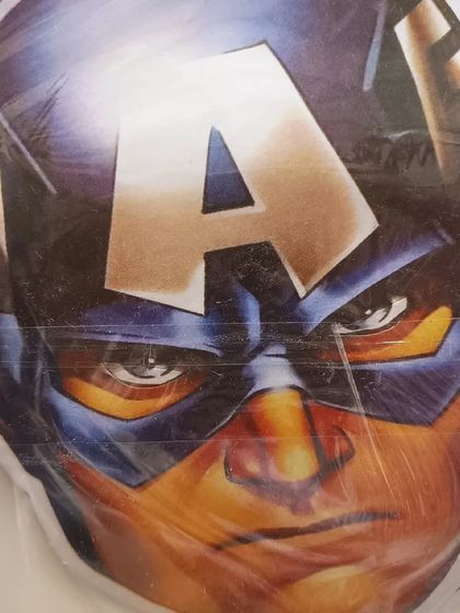 A Captain America face mask, perfect for kids' birthday parties. I stock a variety of superhero and character masks to match your party's theme.