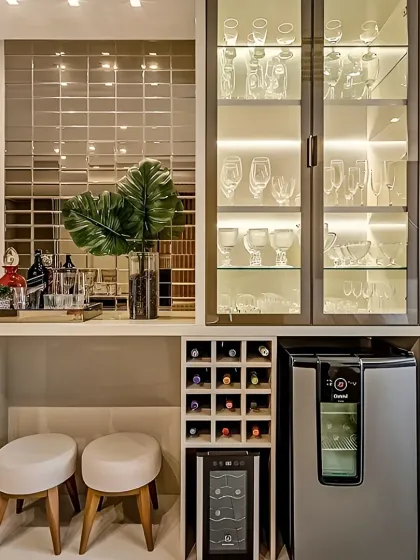 This compact home bar unit is perfect for entertaining. I included a glass-front cabinet with internal lighting to display fine glassware, a built-in wine rack, a mini-fridge, and a sleek countertop with comfortable stools, all accented by a stylish tiled backsplash.