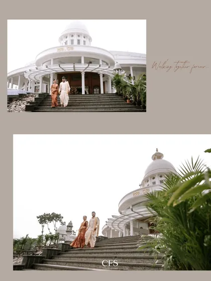 A wide shot of the couple descending the steps of a magnificent venue. This architectural portrait emphasizes the grandeur and scale of their wedding day.