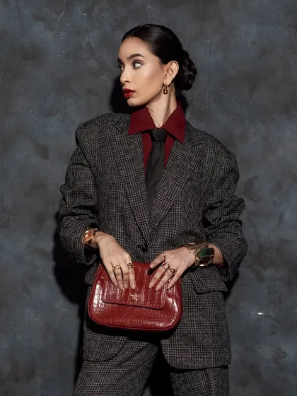 This shot shows how the makeup works with accessories to create a complete, cohesive story for a fashion editorial.