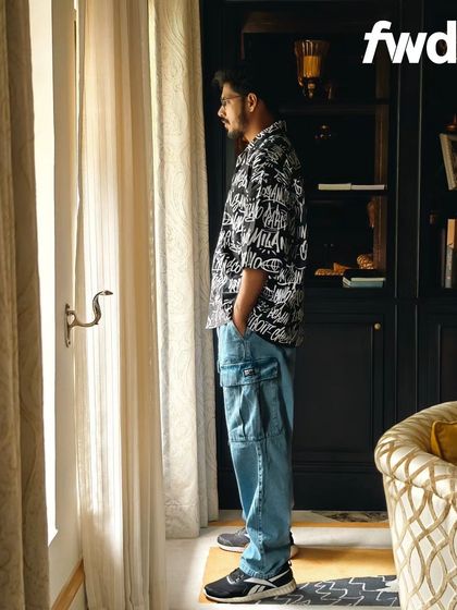 A side-profile shot from the H&M and Myntra FWD campaign. This angle highlights the relaxed fit of the outfit and creates a contemplative mood, adding depth to the fashion story.