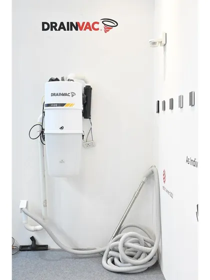 We believe a healthy home starts with clean air. This is a look at our Drainvac central vacuum system, a powerful solution we integrate to completely remove dust, dander, and other allergens from your living spaces, providing significant relief for allergy sufferers.