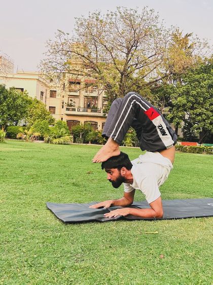 A variation of the forearm stand, this pose challenges balance and opens the shoulders and back.
