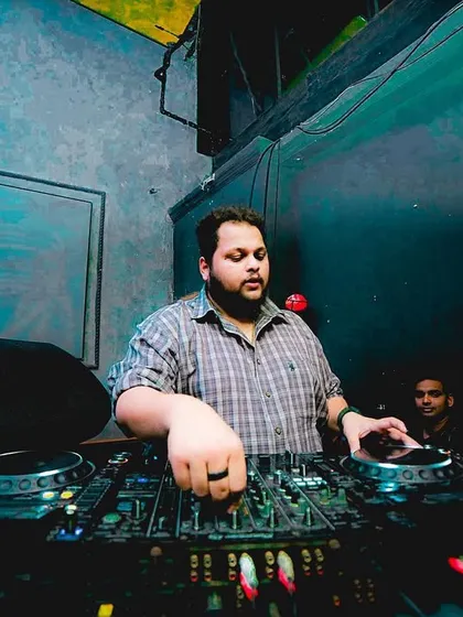 A win is a win, big or small. A shot of me focused on the mix, celebrating every successful gig.